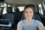 selfie of a woman in a car